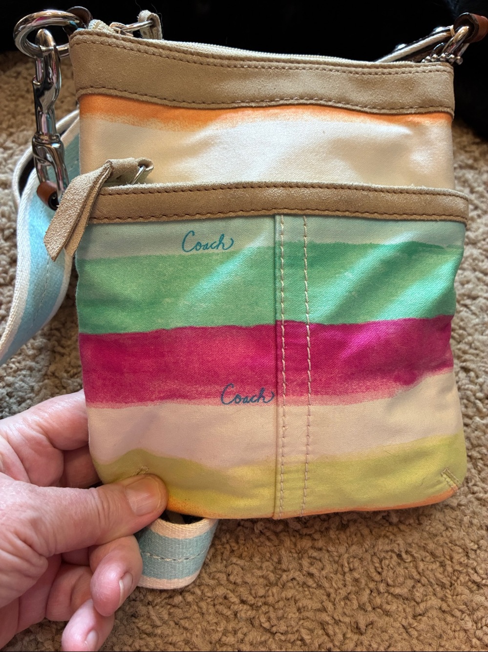Coach Multicolor Canvas Crossbody bag with Turquoise Lining.